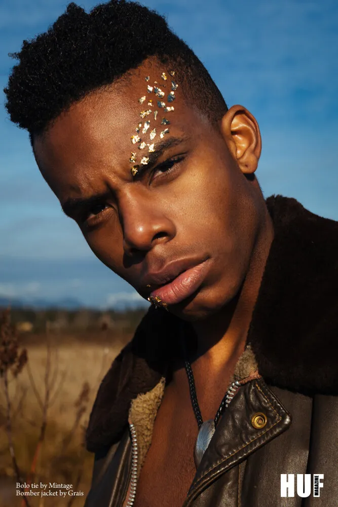 HUF Magazine editorial close-up: model with sequin details above the eye, wearing a leather jacket