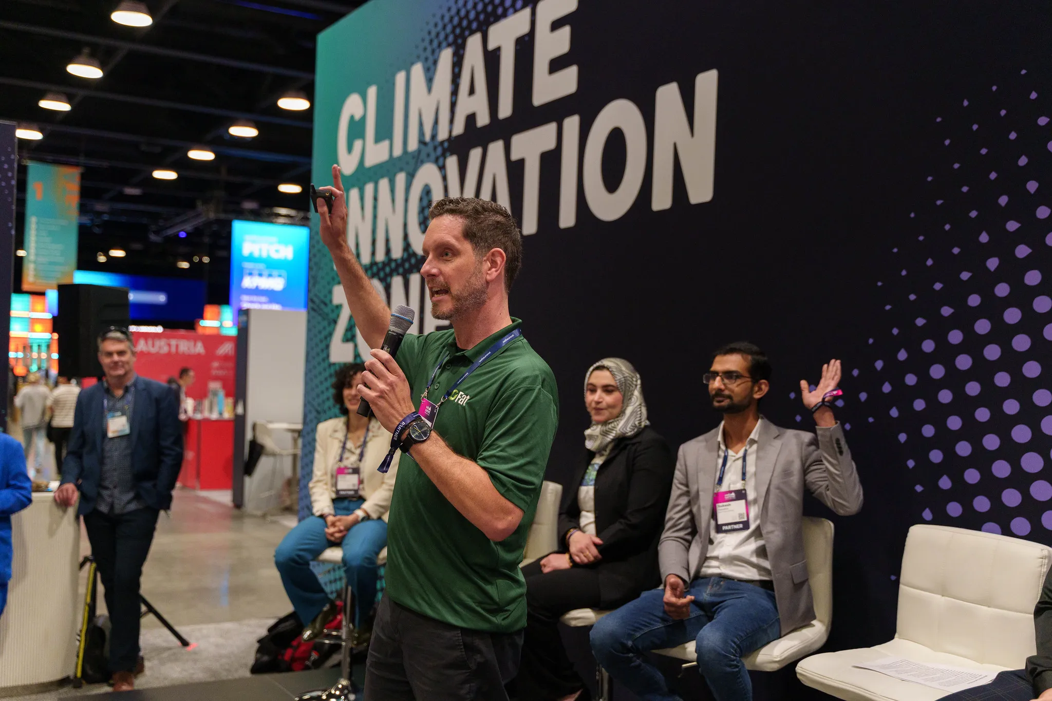 Panel discussion on stage in the Climate Innovation Zone at Web Summit 2026